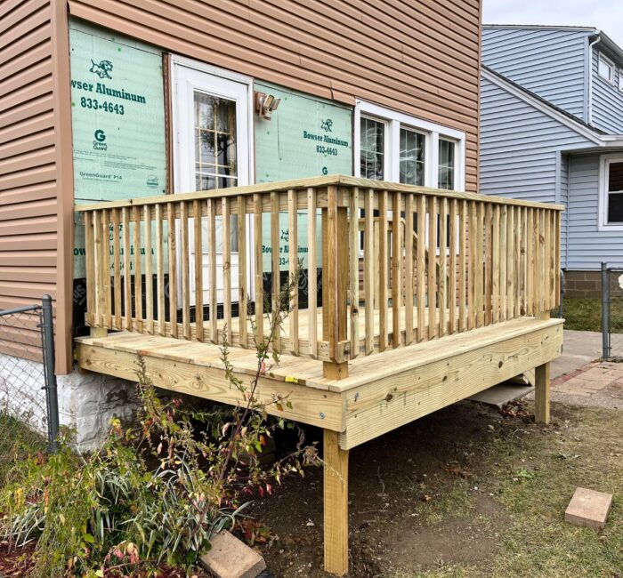 Wooden deck installed by Bauer specialty