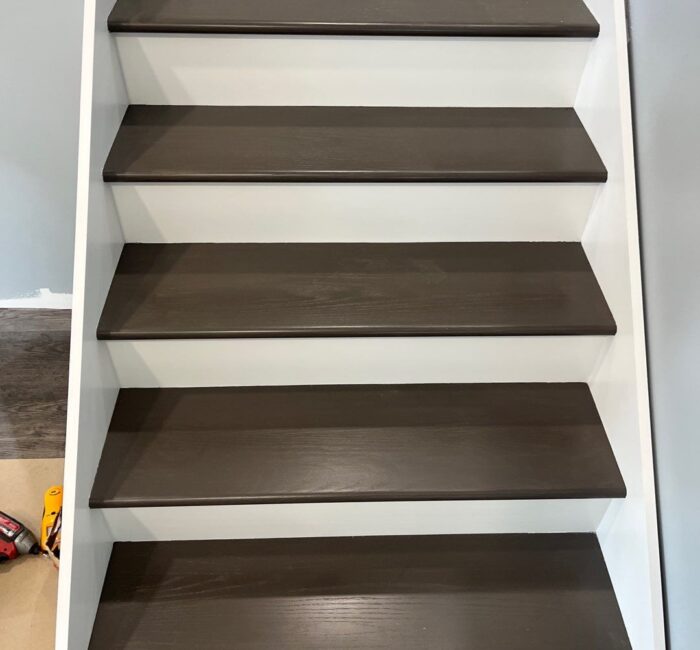 Brown and white steps installed by Bauer Specialty