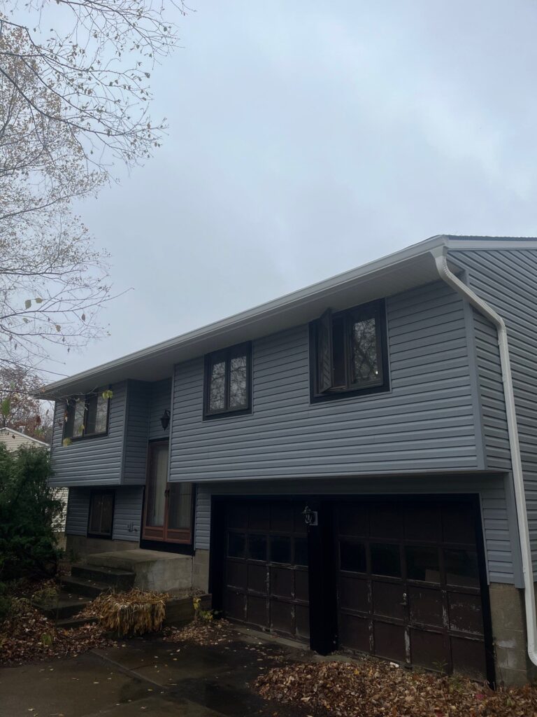 White vinyl siding on house