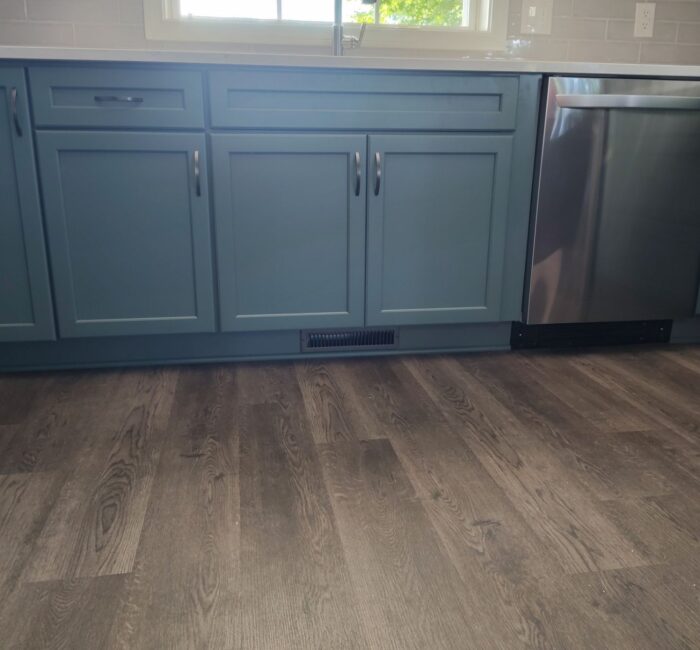 New blue kitchen cabinets installed by Bauer Specialty