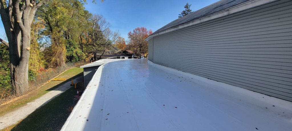 down-net_http20250918-169-bmlkc5 Roof coating on waldemeer installed by Bauer Specialty